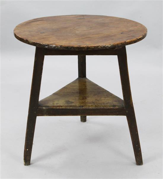 A George III stained pine and fruitwood cricket table, W.2ft 3in. H.2ft 4in.